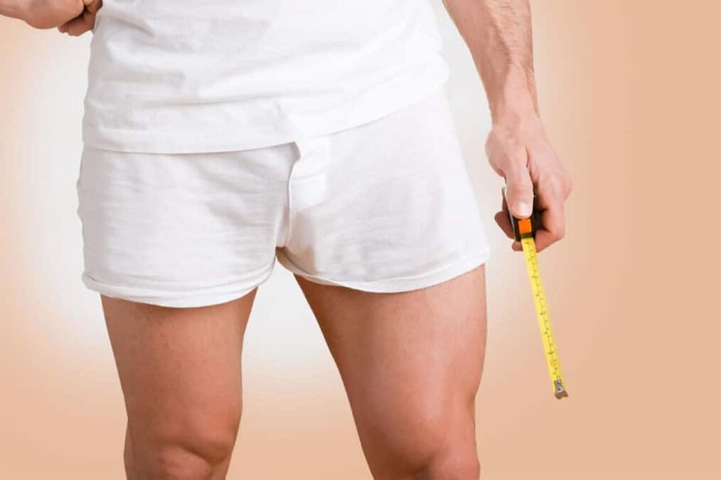 a man with a tape measure who wants to increase the thickness of the penis